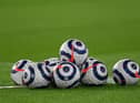 Premier League match balls. (Photo by Shaun Botterill/Getty Images)