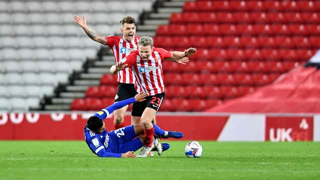Andre Dozzell was shown a red card for a foul on Grant Leadbitter