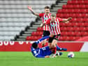 Andre Dozzell was shown a red card for a foul on Grant Leadbitter