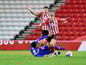 Andre Dozzell was shown a red card for a foul on Grant Leadbitter