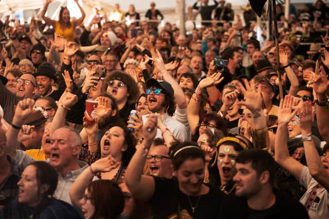 Crowds at the Lindisfarne Festival.