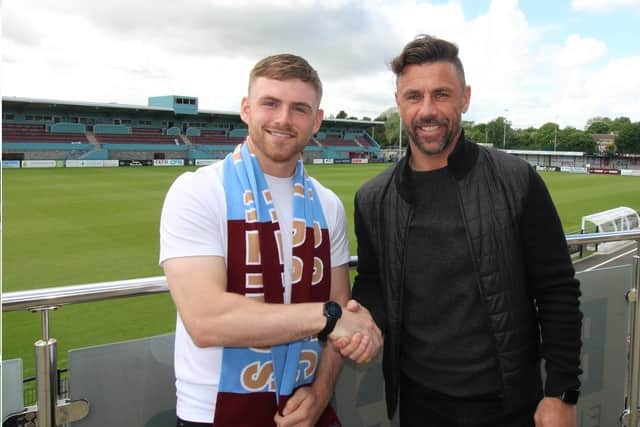 New signing Mackenzie Heaney alongside Kevin Phillips