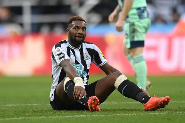 Newcastle United player Allan Saint-Maximin reacts whilst sat on the floor during the Premier League match between Newcastle United and Fulham FC at St. James Park on January 15, 2023 in Newcastle upon Tyne, England. (Photo by Stu Forster/Getty Images)