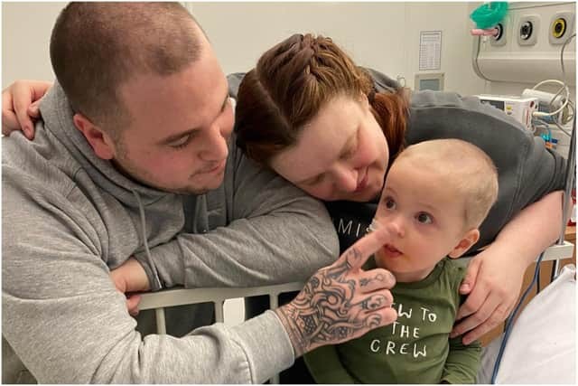 Parents Connor Gardner and Rachel Nicholson with son Max.