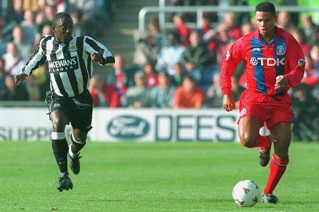 15 OCT 1994:  JOHN SALAKO OF CRYSTAL PALACE IS PURSUED BY RUEL FOX OF NEWCASTLE UNITED DURING THE PREMIERSHIP GAME AT SELHURST PARK.  Mandatory Credit: Clive Mason/ALLSPORT