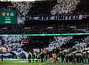 Newcastle United fans wave flags and show their support prior to the Carabao Cup Final (Photo by Julian Finney/Getty Images)
