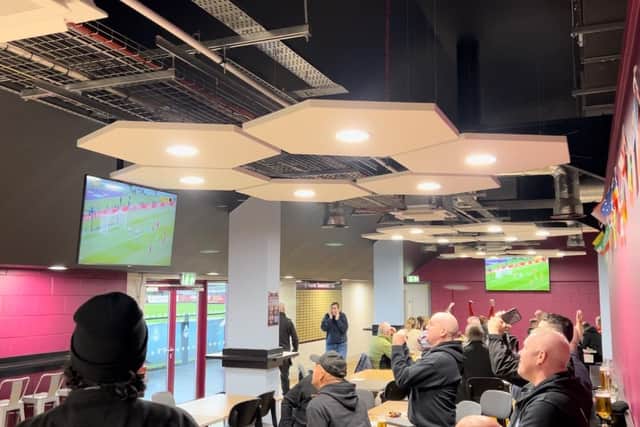 Fans celebrate England's goals against Iran