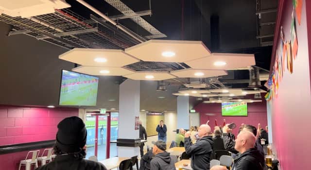 Fans celebrate England's goals against Iran