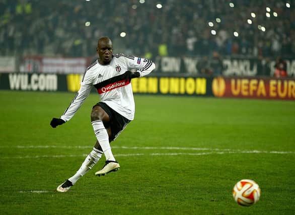 ISTANBUL, TURKEY - FEBRUARY 26: Demba Ba of Besiktas scores his penalty in the shoot out during the 2nd leg of the UEFA Europa League Round of 32 match between Besiktas and Liverpool at the Ataturk Olympic Stadium on February 26, 2015 in Istanbul, Turkey. (Photo by Richard Heathcote/Getty Images)