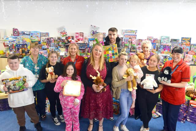 Viv Watts of Hope 4 Kidz handing over toys at Sunderland Royal Hospital.