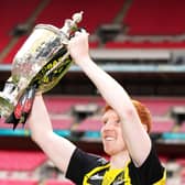 Hebburn Town's Michael Richardson celebrates with lifting the Buildbase FA Vase 2019/20 Trophy after victory in the Final at Wembley Stadium, London. PA picture.