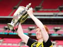 Hebburn Town's Michael Richardson celebrates with lifting the Buildbase FA Vase 2019/20 Trophy after victory in the Final at Wembley Stadium, London. PA picture.