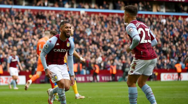 BIRMINGHAM, ENGLAND - MARCH 05: Douglas Luiz celebrates with Philippe Coutinho of Aston Villa after scoring their team's second goal during the Premier League match between Aston Villa and Southampton at Villa Park on March 05, 2022 in Birmingham, England. (Photo by Marc Atkins/Getty Images)
