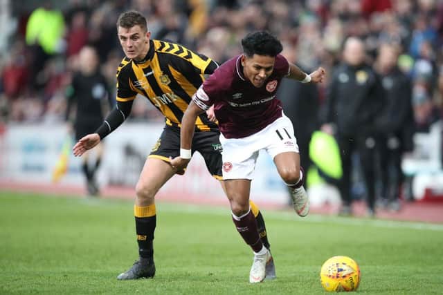 Demetri Mitchell in action for Hearts.