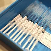 Syringes containing the AstraZeneca Covid-19 vaccines. (Photo by Paul Kane/Getty Images)