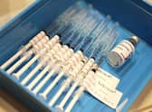 Syringes containing the AstraZeneca Covid-19 vaccines. (Photo by Paul Kane/Getty Images)