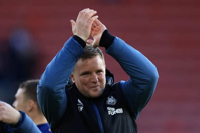 Newcastle United head coach Eddie Howe applauds the club's fans at the St Mary's Stadium.