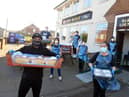 Nico Ali and Joanne Crosby make up food hampers for vulnerable residents at the Red Hackle in Jarrow.