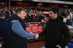 Newcastle United head coach Eddie Howe and Arsenal manager Mikel Arteta shake hands before Tuesday night's game.