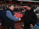Newcastle United head coach Eddie Howe and Arsenal manager Mikel Arteta shake hands before Tuesday night's game.