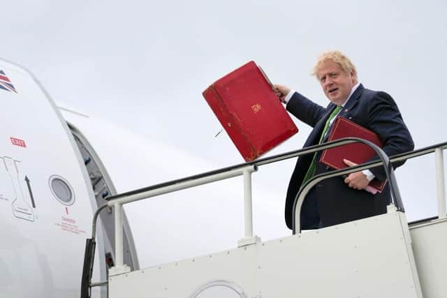 Prime Minister Boris Johnson pictured boarding a plane at Stansted Airport this week (Wednesday, May 11). Picture: Frank Augstein/WPA Pool/Getty Images.