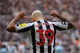 Bruno Guimaraes celebrates after scoring Newcastle United's third goal.