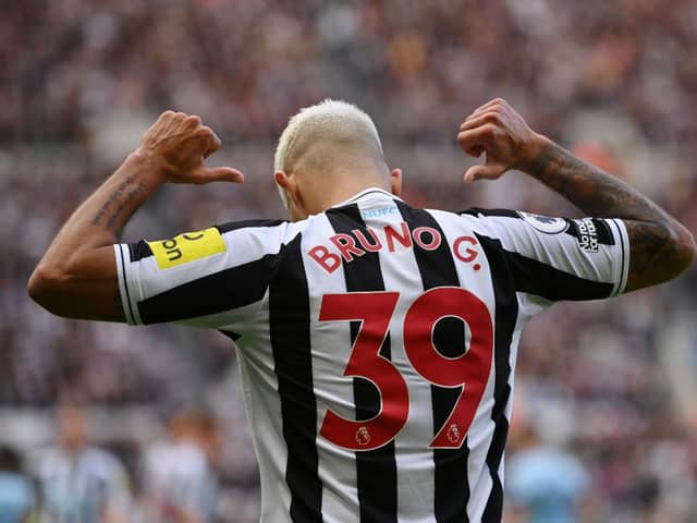 Bruno Guimaraes celebrates after scoring Newcastle United's third goal.
