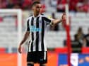 Miguel Almiron celebrates one of his goals against Benfica.