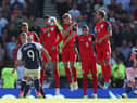 Scotland's Leigh Griffiths scores a free kick during their last game against England; a 2-2 draw at Hampden Park in 2017. PA image.