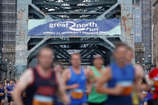 Branding as runners cross the Tyne Bridge during the Great North Run.