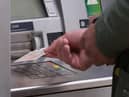 Cash machine numbers fall.