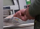 Cash machine numbers fall.