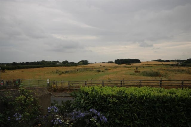 The property has views over the garden and open fields beyond.