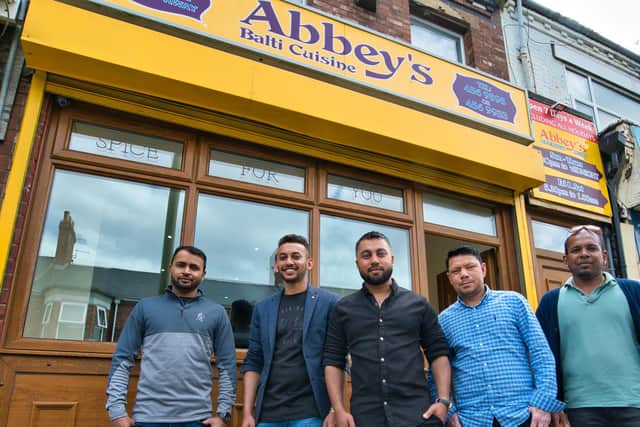 Owner of Abbey's South Shields, Rubel Jamal - center, with chefs from the takeaway.