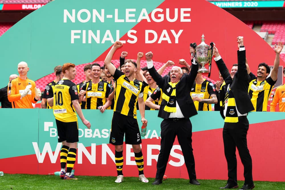 Hebburn Town's Michael Richardson, left, Louis Storey and chairman Vincent Pearson celebrate at Wembley. Picture: John Walton/PA Wire.