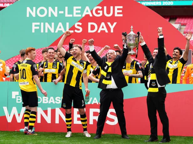 Hebburn Town's Michael Richardson, left, Louis Storey and chairman Vincent Pearson celebrate at Wembley. Picture: John Walton/PA Wire.