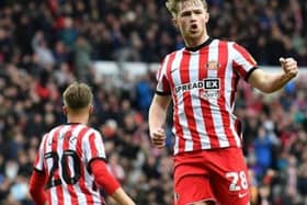 Joe Gelhardt, in one-off red shorts, scoring his first goal on home turf with Jack Clarke beside him.