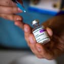A health worker prepares a vaccine (Photo by Kirsty O'Connor / POOL / AFP) (Photo by KIRSTY O'CONNOR/POOL/AFP via Getty Images)