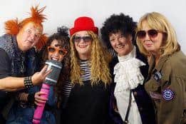Lavender Lasses members pictured during an 80s night in 2020.