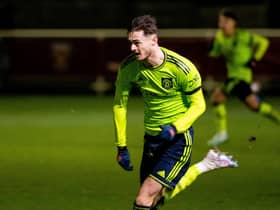 ROMFORD, ENGLAND - JANUARY 20: Joe Hugill of Manchester United in action during the Premier League 2 match between West Ham United and Manchester United at Rush Green on January 20, 2023 in Romford, England. (Photo by Ash Donelon/Manchester United via Getty Images)