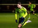 ROMFORD, ENGLAND - JANUARY 20: Joe Hugill of Manchester United in action during the Premier League 2 match between West Ham United and Manchester United at Rush Green on January 20, 2023 in Romford, England. (Photo by Ash Donelon/Manchester United via Getty Images)