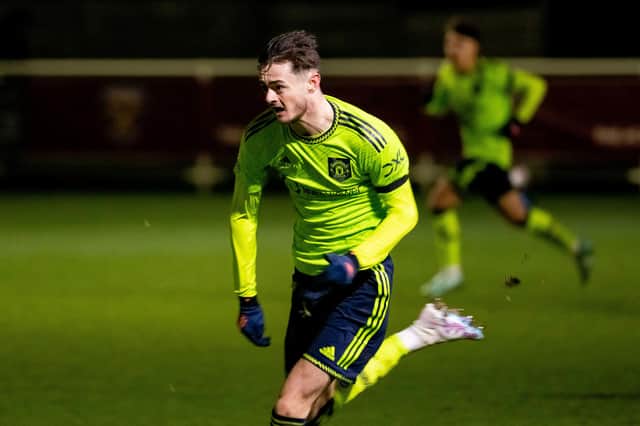 ROMFORD, ENGLAND - JANUARY 20: Joe Hugill of Manchester United in action during the Premier League 2 match between West Ham United and Manchester United at Rush Green on January 20, 2023 in Romford, England. (Photo by Ash Donelon/Manchester United via Getty Images)