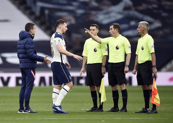 Tottenham Hotspur's Pierre-Emile Hojbjerg approaches referee Peter Bankes after the Premier League match at Tottenham Hotspur Stadium.