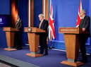 Chief Medical Officer, Sir Chris Whitty, Prime Minister, Boris Johnson and Chief Scientific Adviser, Sir Patrick Vallance address the nation during a press conference on the plan for Living with Covid. Picture: Tolga Akmen - WPA Pool/Getty Images.