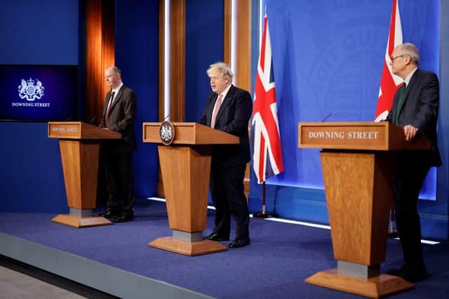 Chief Medical Officer, Sir Chris Whitty, Prime Minister, Boris Johnson and Chief Scientific Adviser, Sir Patrick Vallance address the nation during a press conference on the plan for Living with Covid. Picture: Tolga Akmen - WPA Pool/Getty Images.