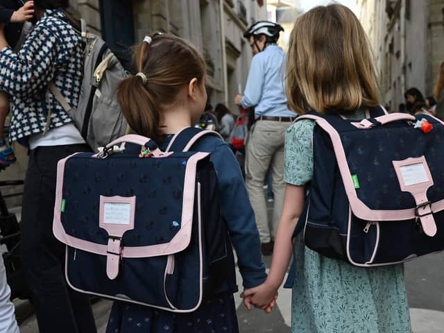 It can be daunting for some children going back to school after a long, summer break. Photo by Emmanuel Dunand via Getty Images