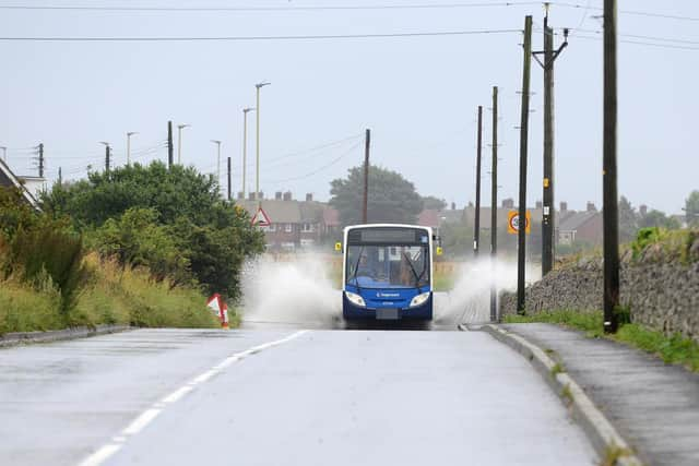 Flooding on Lizard Lane, Whitburn, in recent years. There are now plans to tackle the problem.