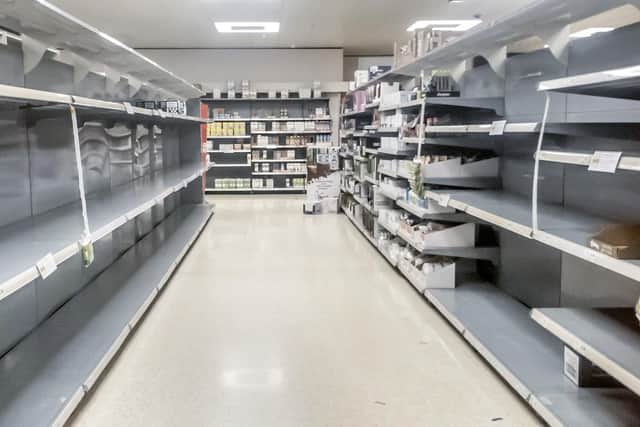 Empty supermarket shelves as shoppers bulk buy during the coronavirus pandemic. Photo by Danny Lawson/PA Wire.