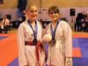 Lyla Raine 11 and Holly Mataric 12 with their medals.