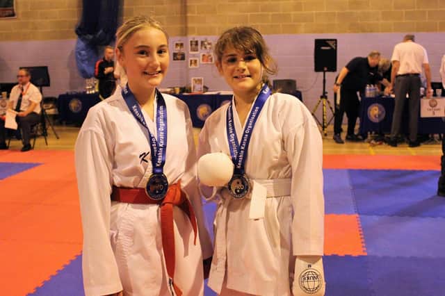 Lyla Raine 11 and Holly Mataric 12 with their medals.